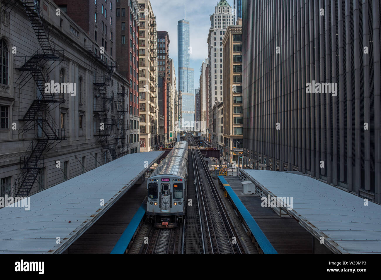 view of Chicago EL train and trump tower from adams/Wabash station Stock Photo