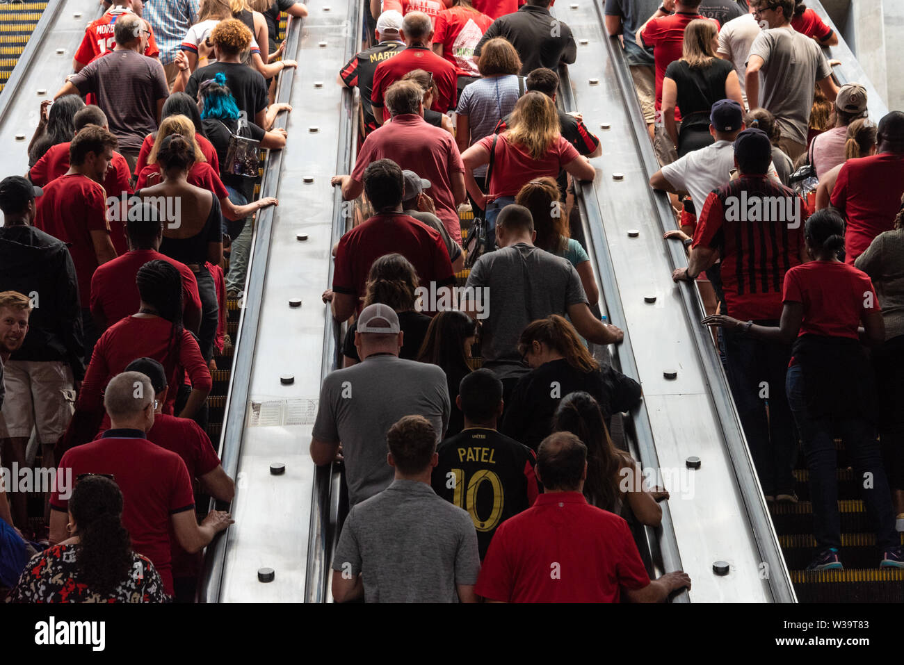 Atlanta United FC fans exiting the MARTA station for the MLS soccer game at the Mercedes-Benz Stadium in downtown Atlanta, Georgia. (USA) Stock Photo