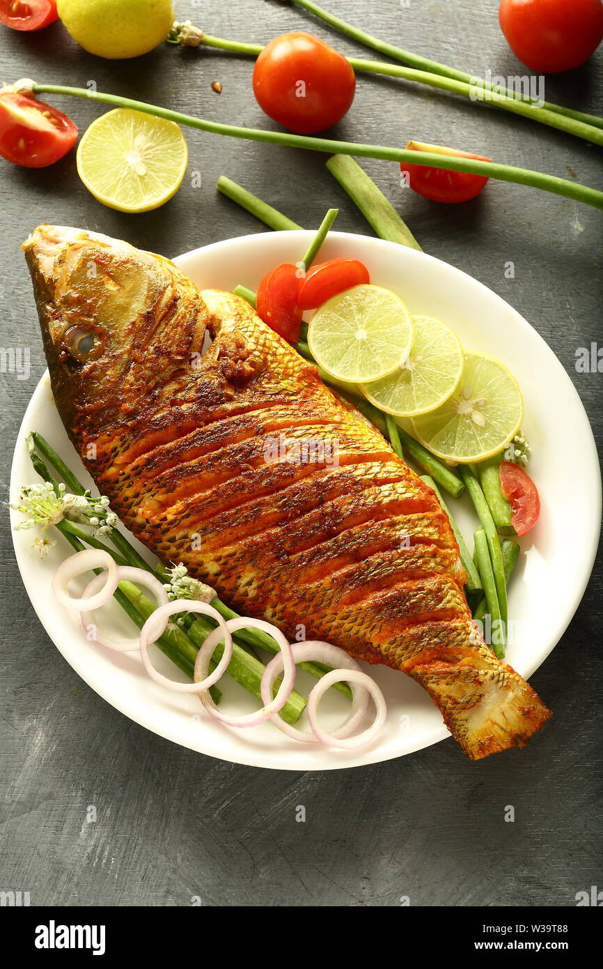 Homemade fried fish -Asian cuisine Stock Photo - Alamy