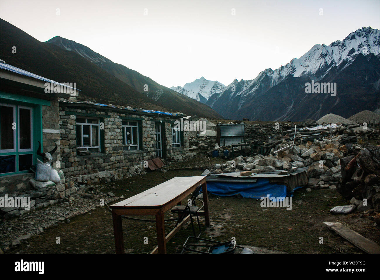 Early morning view of mountains and reconstructed Kyanjin valley. Stock Photo