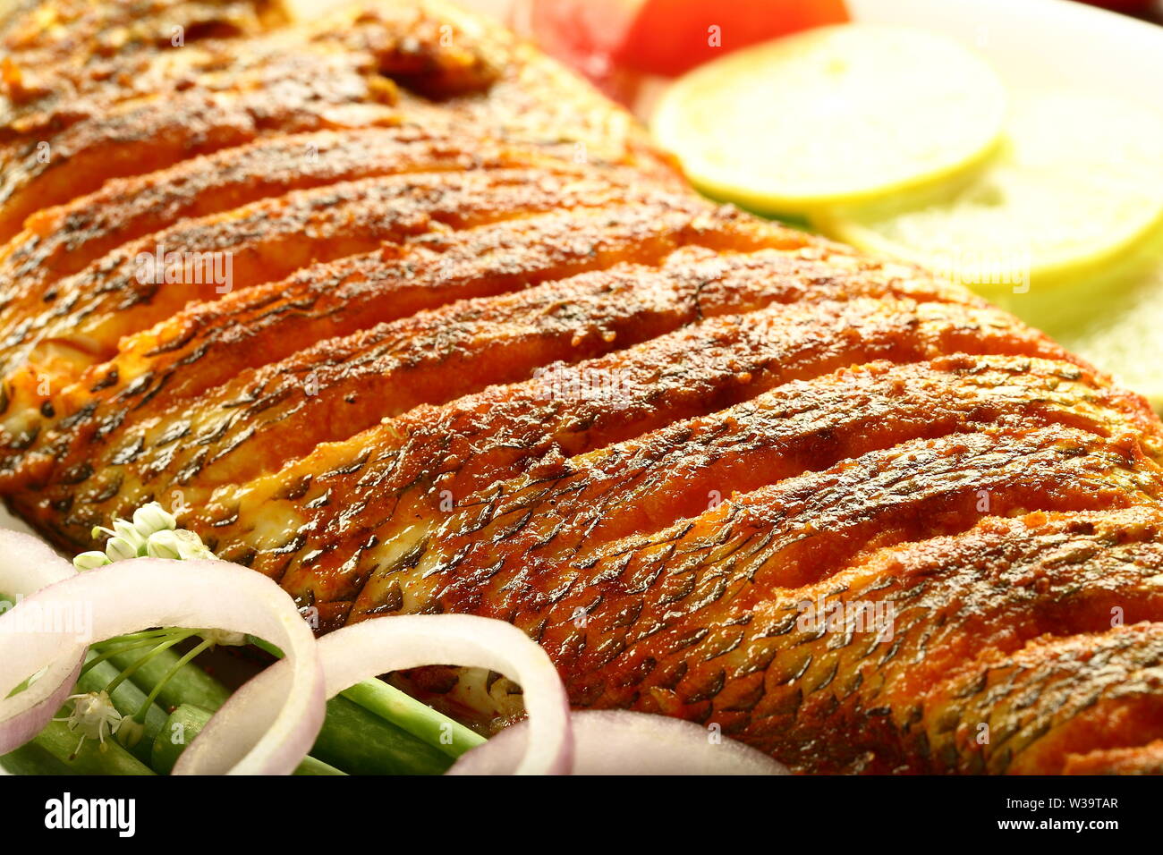 Closeup image- delicious and spicy roasted fish Stock Photo