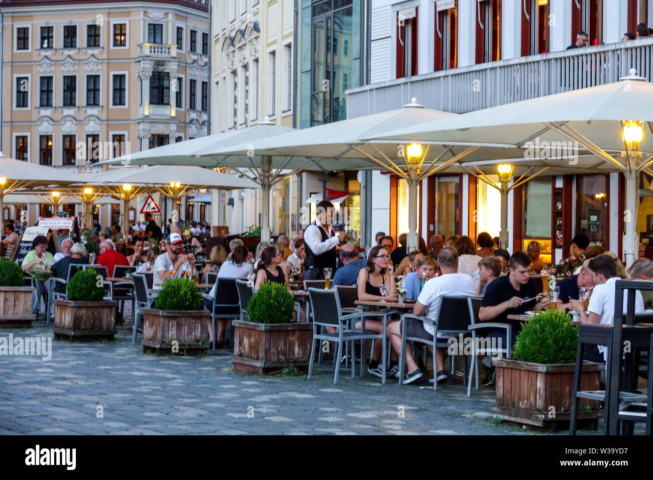 Neumarkt Dresden Restaurant Germany People at Frauenkirche Square bar cafe Altstadt Stock Photo