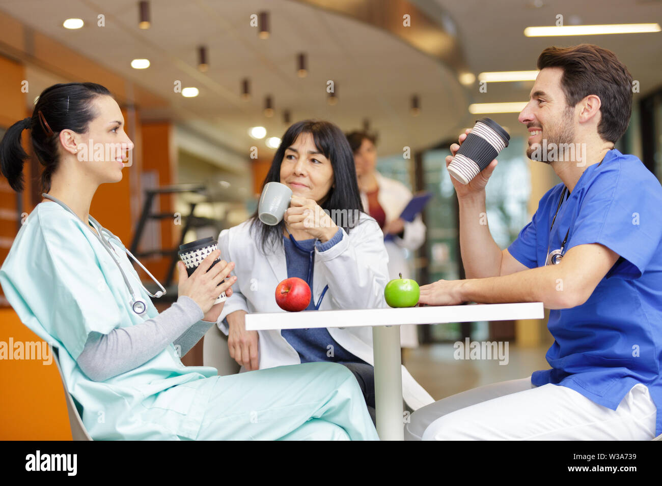 3 doctors during lunch time Stock Photo Alamy