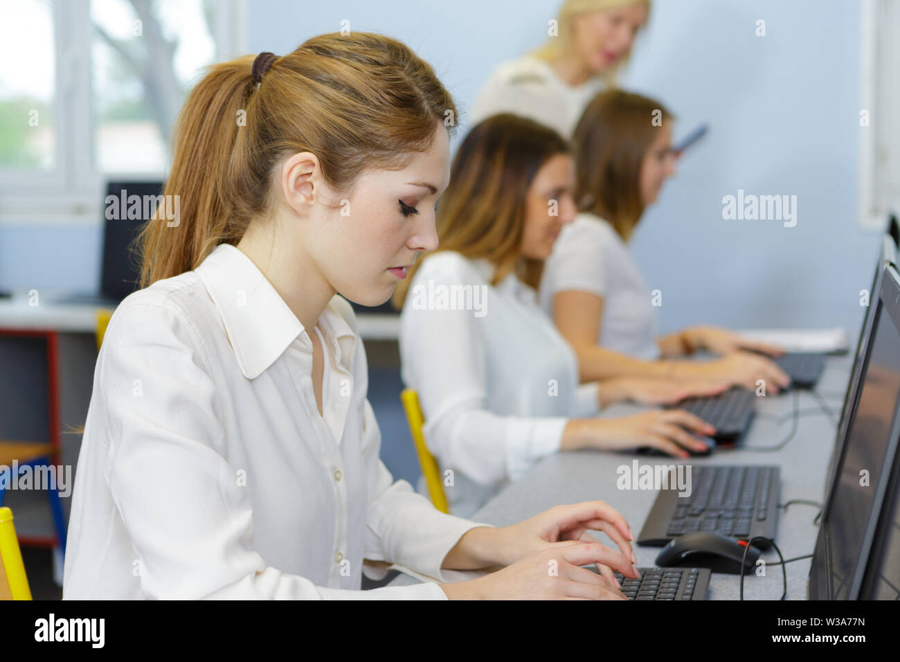 a young woman with computer Stock Photo - Alamy