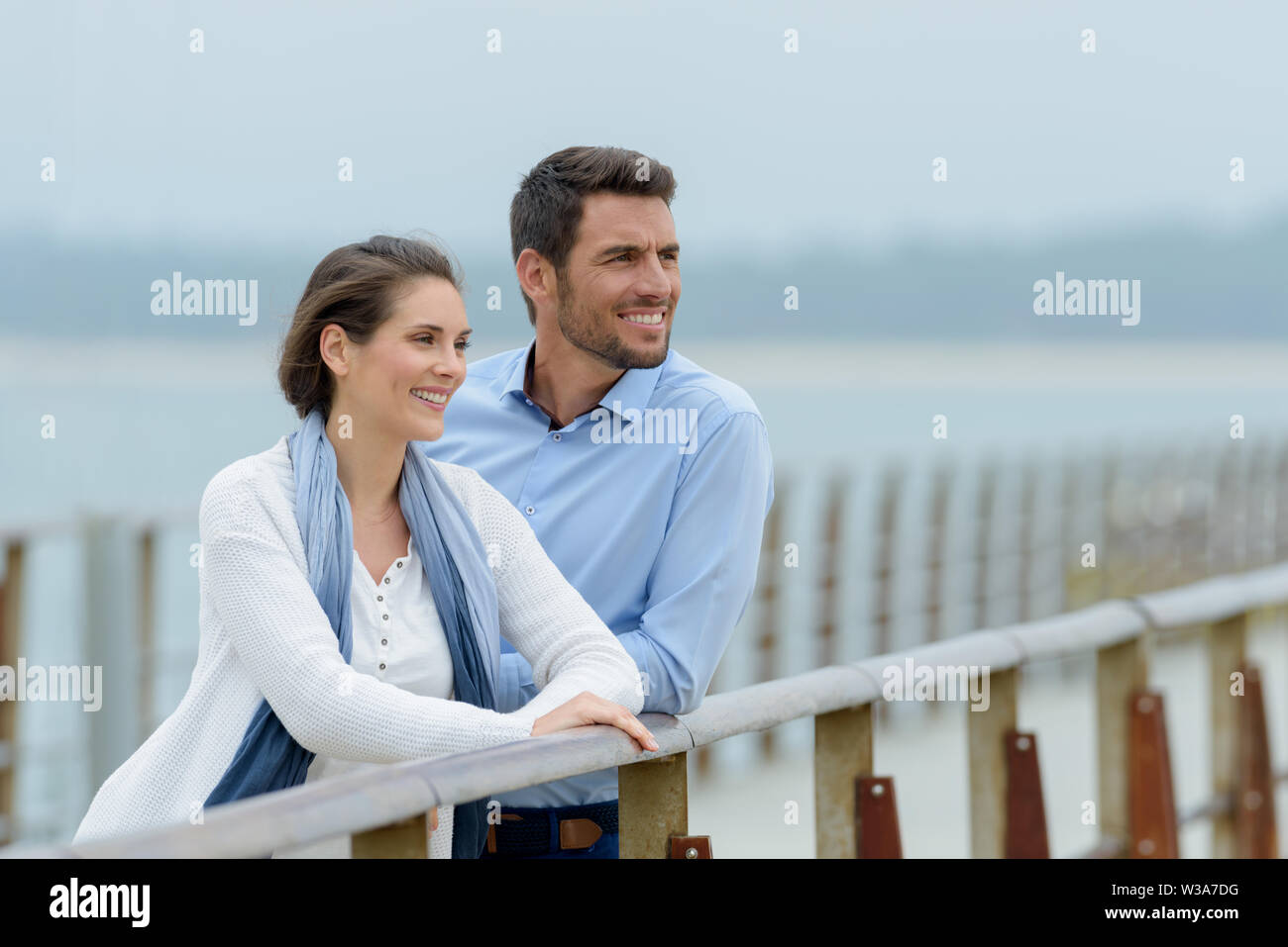 Attractive young loving couple hi-res stock photography and images - Alamy