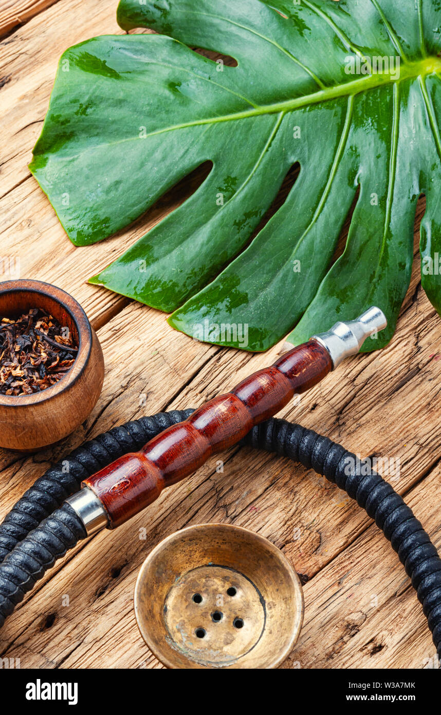 tropical tobacco Details of the eastern kalian.Hookah with tropical flavor.Smoking tropical  tobacco Stock Photo