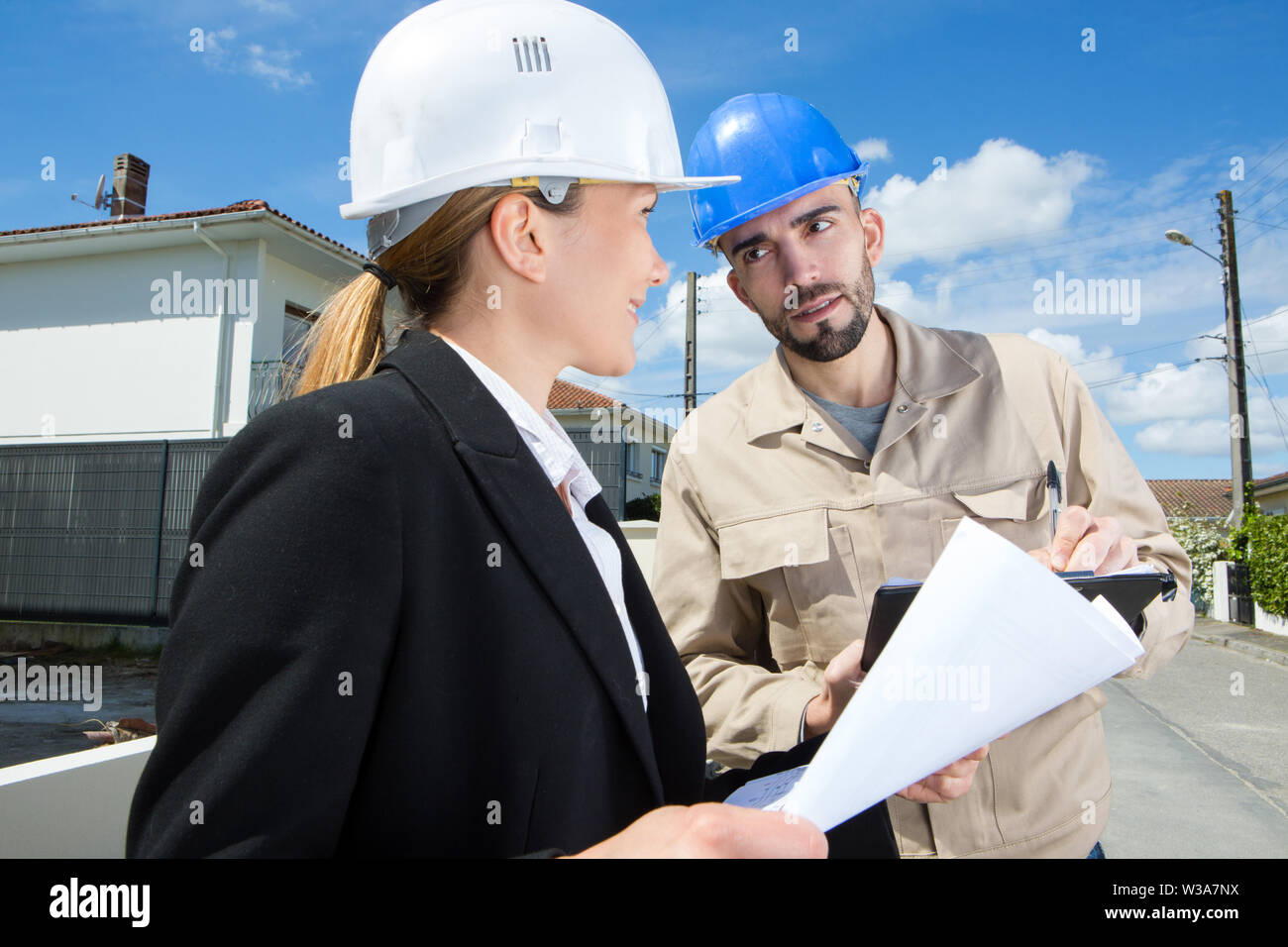 engineer and foreman having a discussion on the site Stock Photo