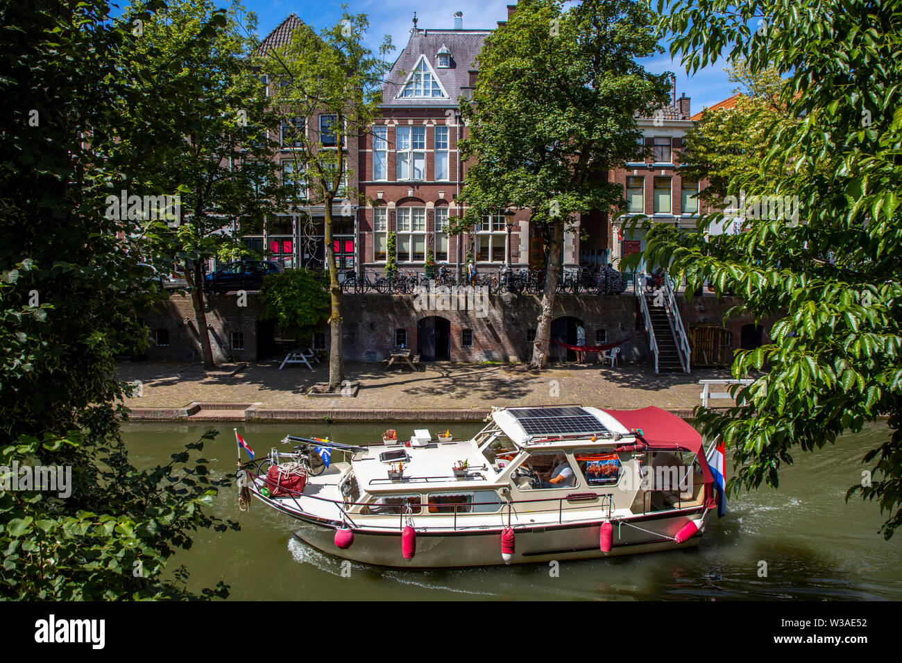 Utrecht, Netherlands, Old Town, Oudegracht, canal, restaurants, pubs, cafes, shops along the