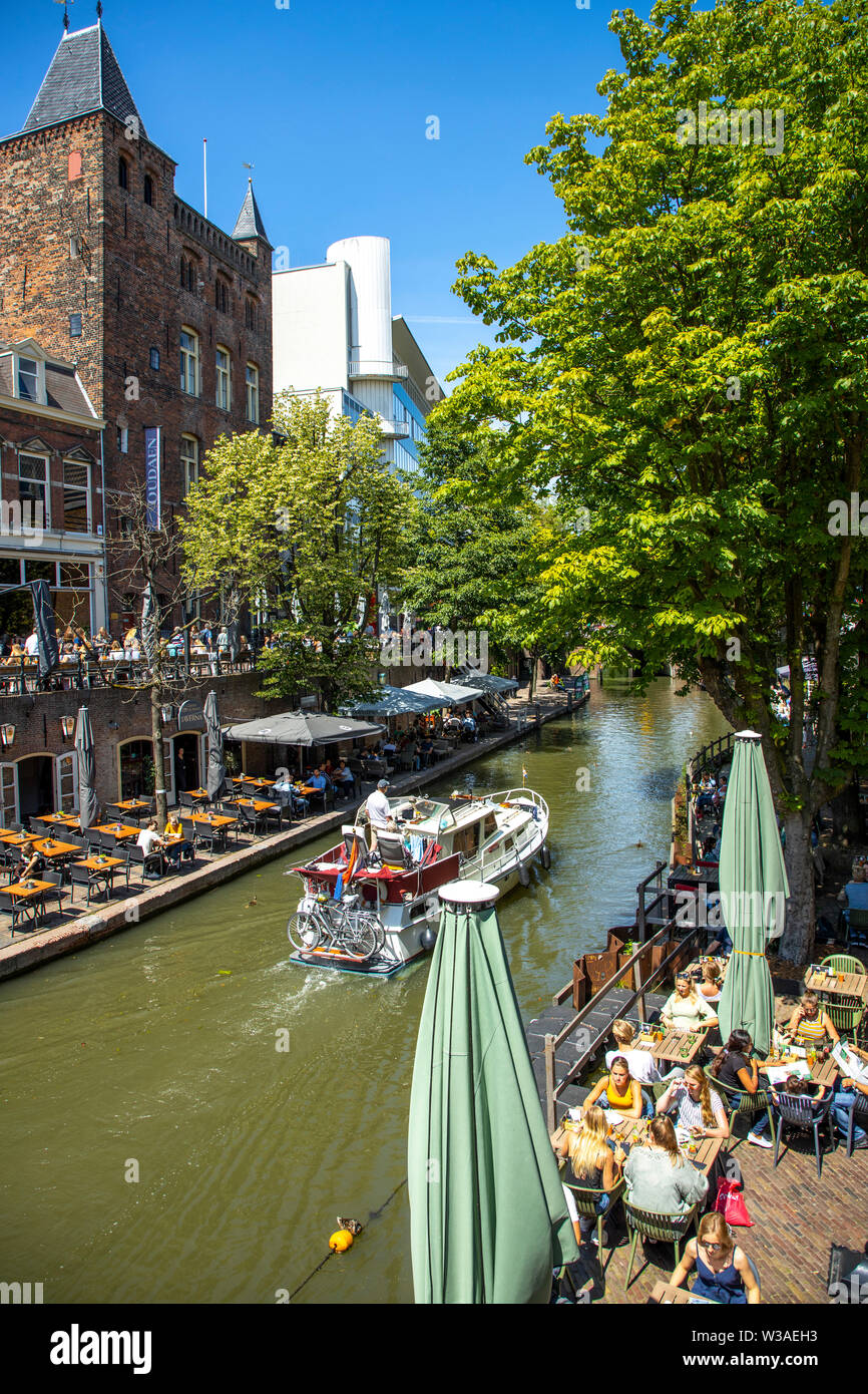 Utrecht, Netherlands, Old Town, Oudegracht, canal, restaurants, pubs, cafes, shops along the