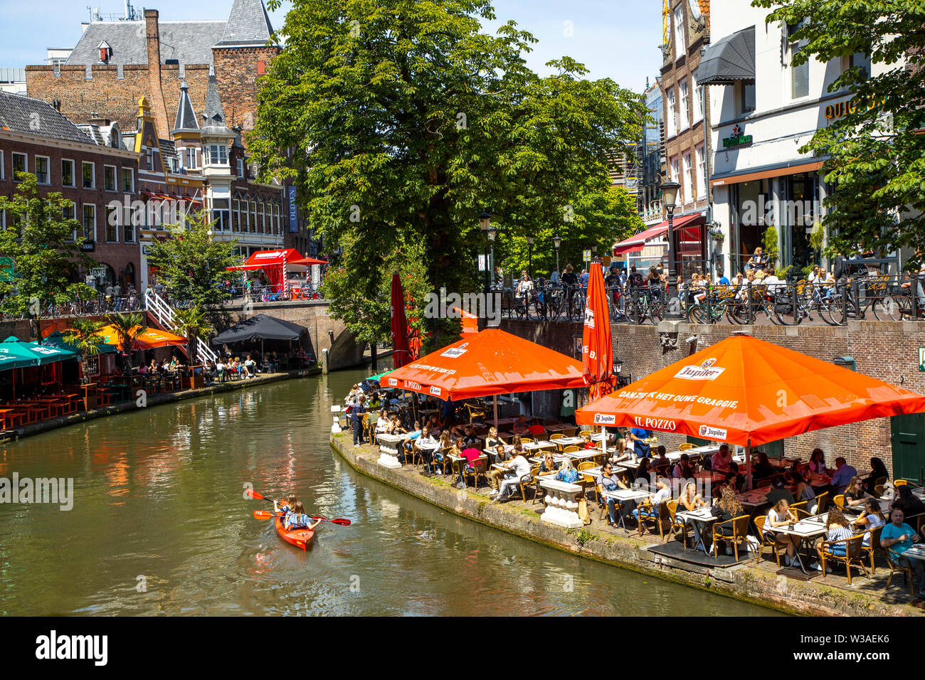 Utrecht, Netherlands, Old Town, Oudegracht, canal, restaurants, pubs, cafes, shops along the