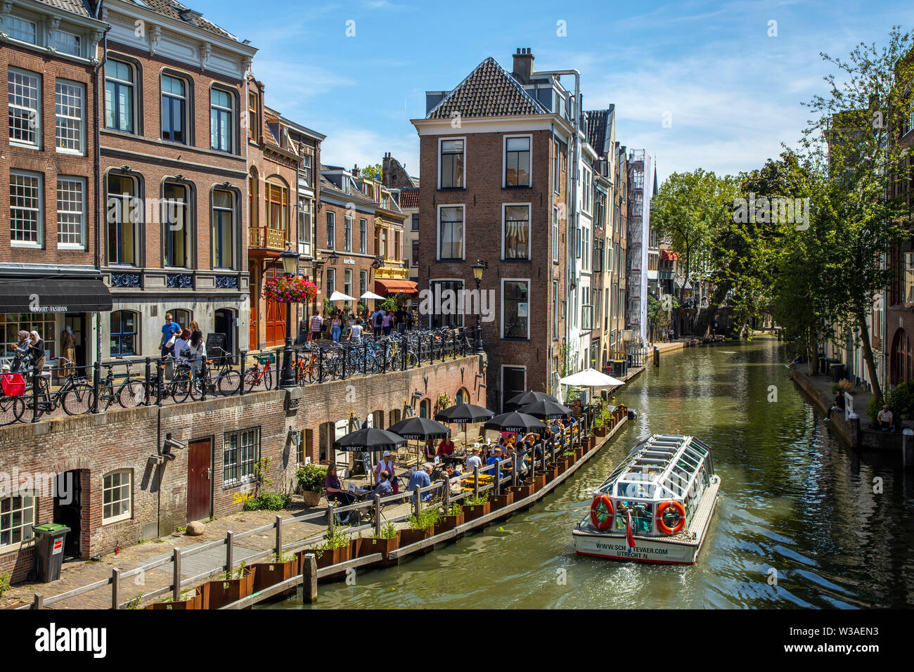 Utrecht, Netherlands, Old Town, Oudegracht, canal, restaurants, pubs, cafes, shops along the