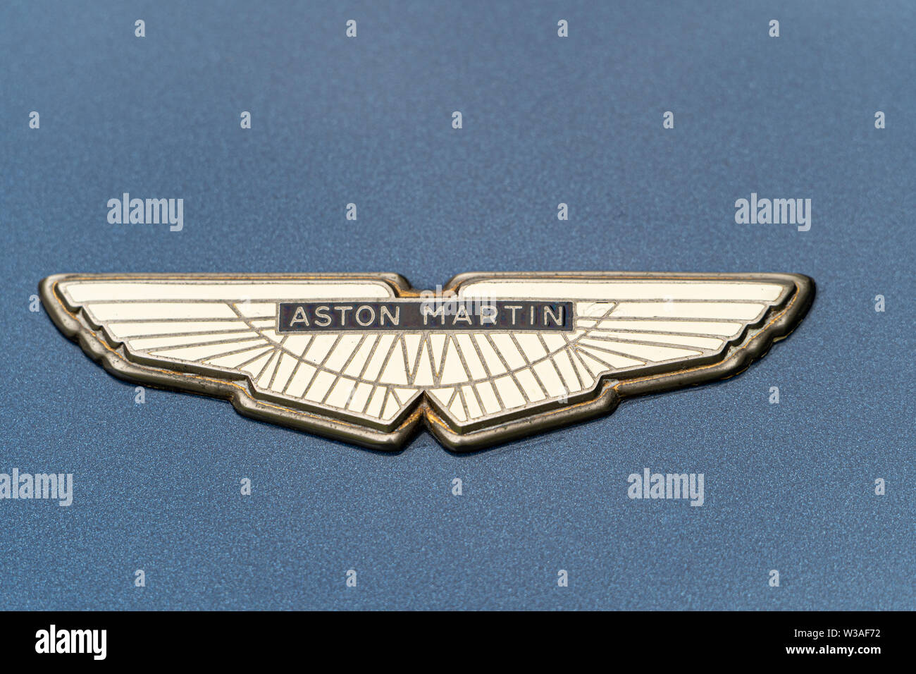 Aston Martin badge / logo on a metalic blue Aston Martin classic car Stock Photo