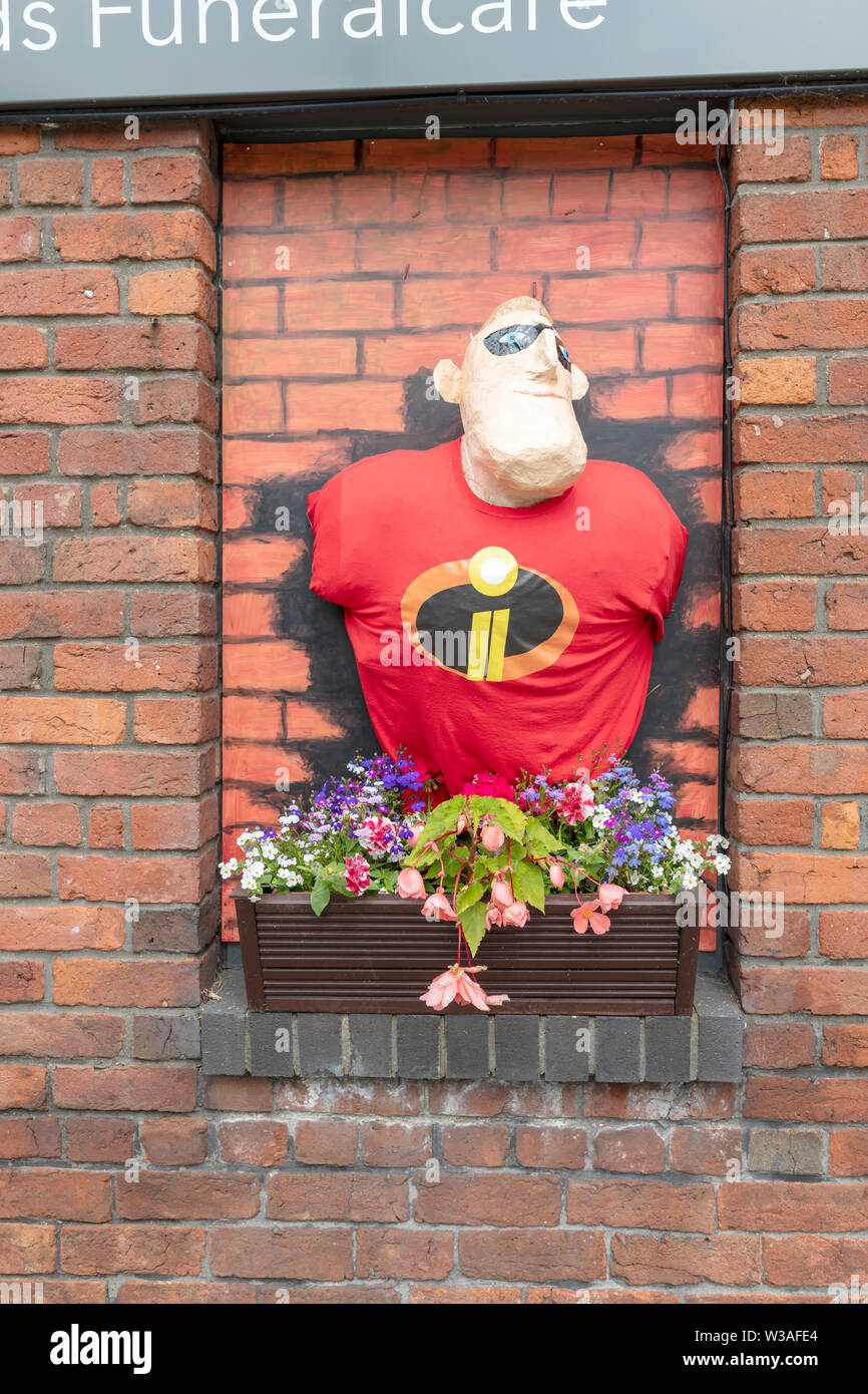 Super hero breaking through a wall hires stock photography and images Alamy