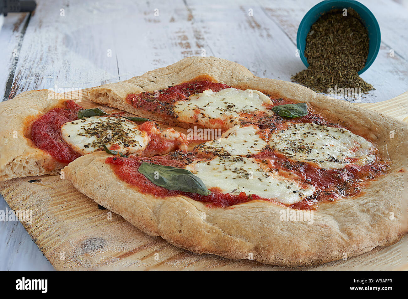 Homemade pizza baked at home. Whole wheat flour, homemade tomato sauce