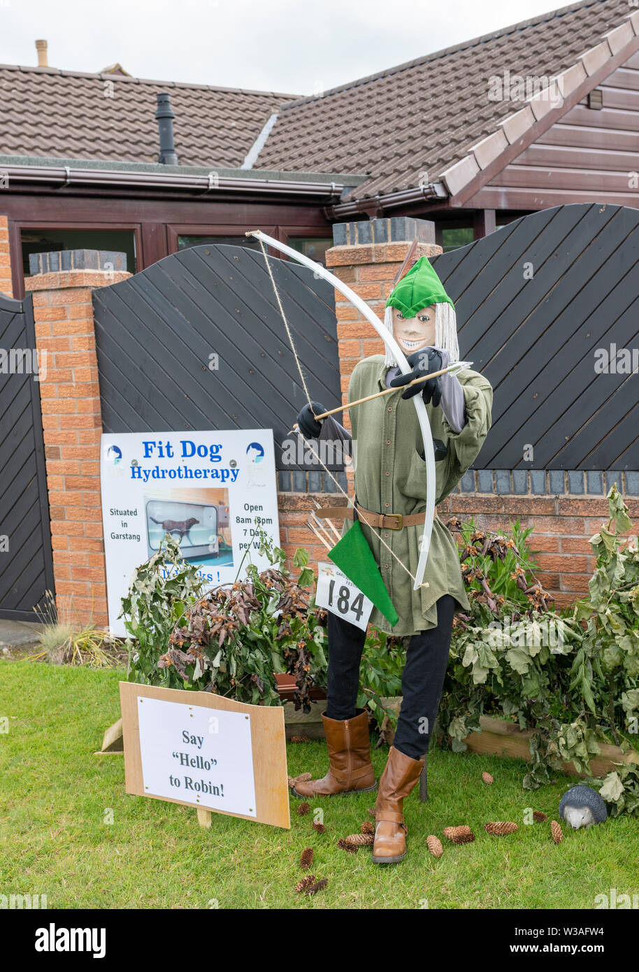 An exhibit at the Garstang Scarecrow Festival. Robin Hood and his longbow Stock Photo