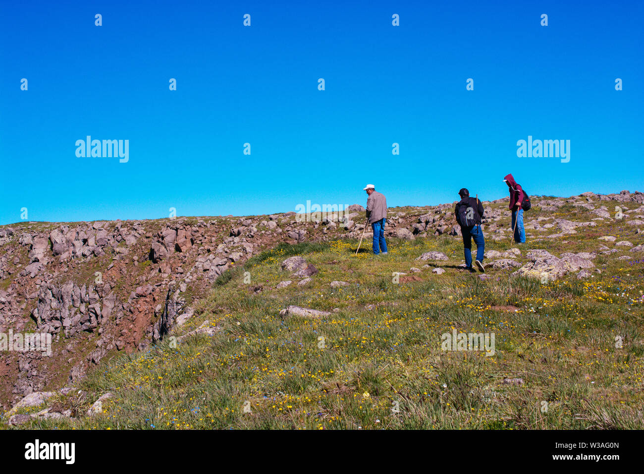 Boy traveler trekking poles hi-res stock photography and images - Alamy