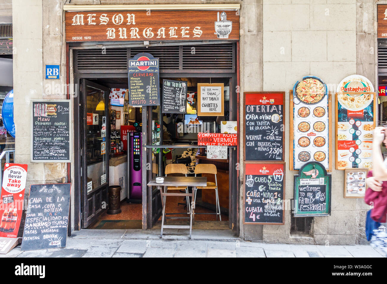Barcelona, Spain-September 5th 2015: Cafe restaurant with many advertising signs. This is in the Gothic quarter Stock Photo