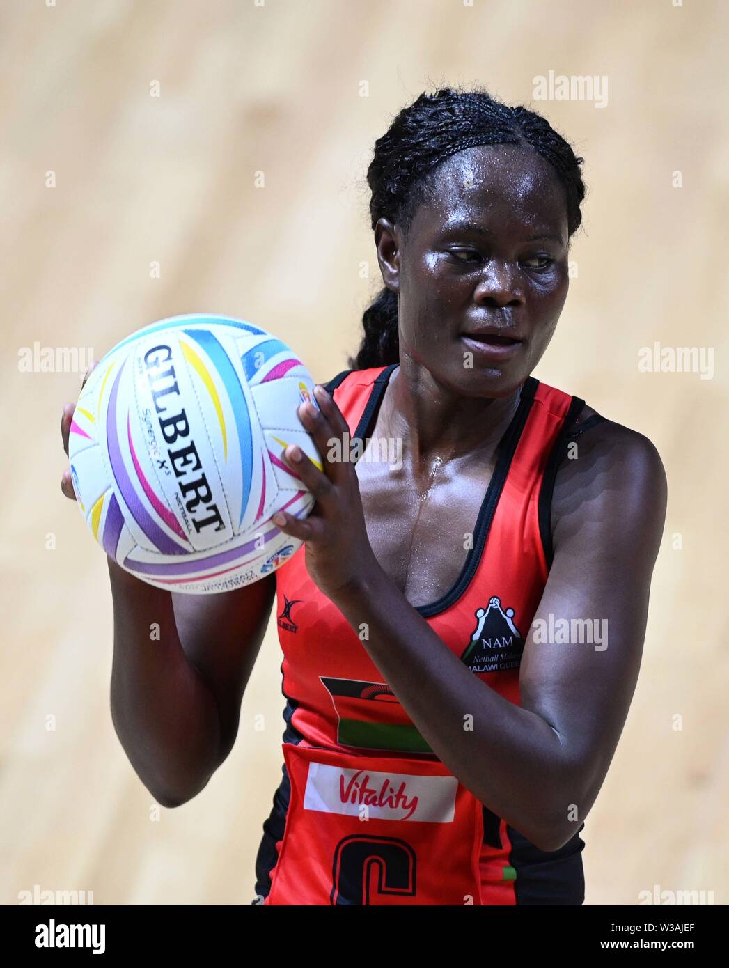 Liverpool, UK. 14 July 2019. Thandie Galleta (Malawi) during the Preliminary game between Malawi and Barbados at the Netball World Cup. M and S arena, Liverpool. Merseyside. UK. Credit Garry Bowdenh/SIP photo agency/Alamy live news. Stock Photo