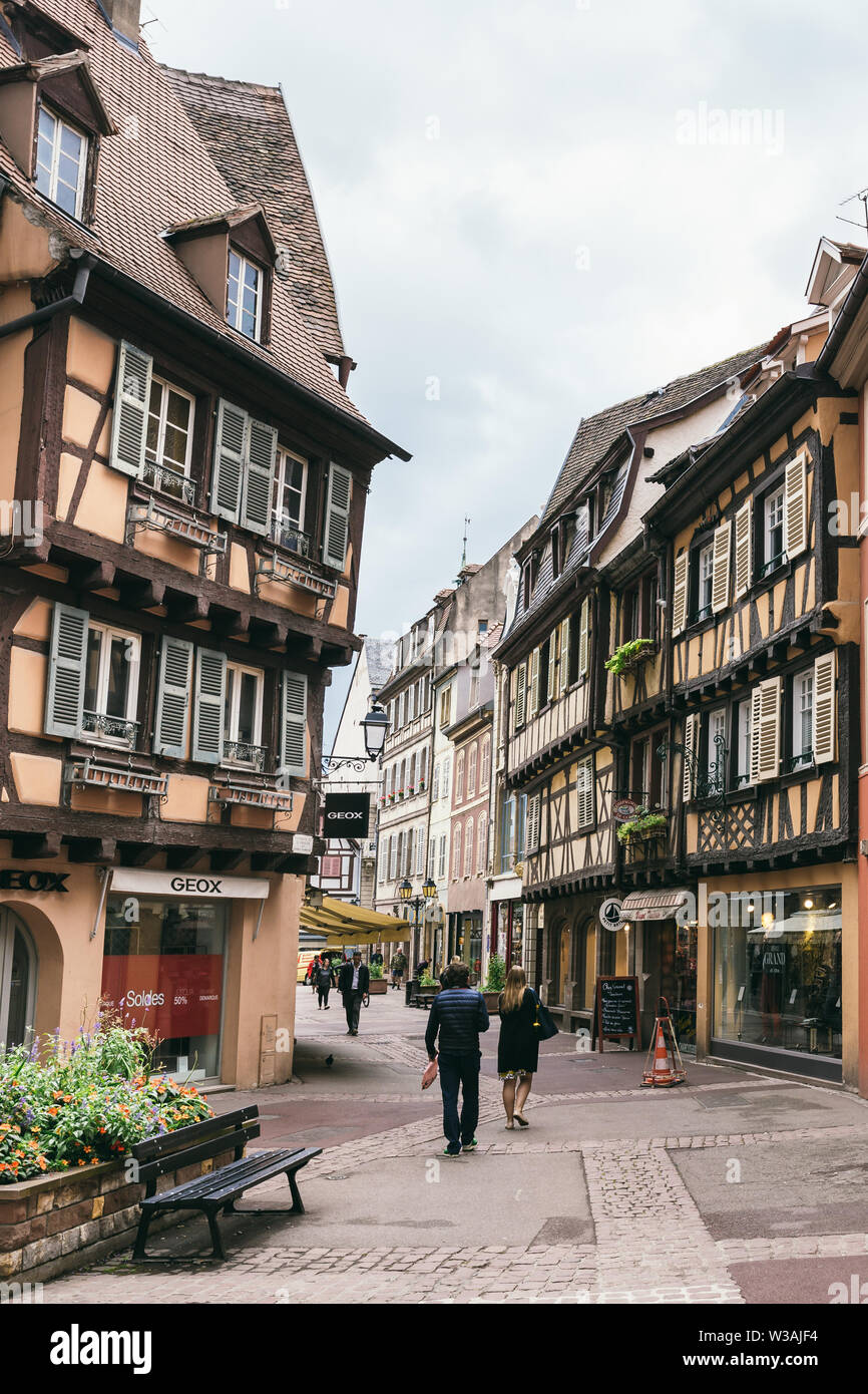 France - July 26, 2017. Old street with in medieval Colmar, Alsace Stock Photo -