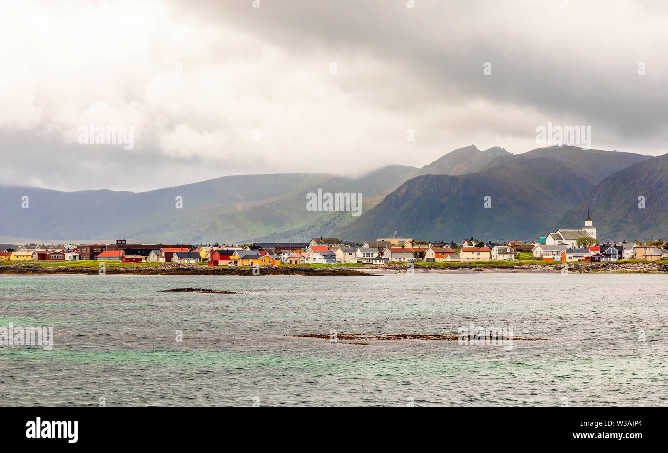 Andenes village panorama with multiple houses and mountains in the background, Lofoten islands, Andoy Municipality, Vesteralen district, Nordland coun Stock Photo