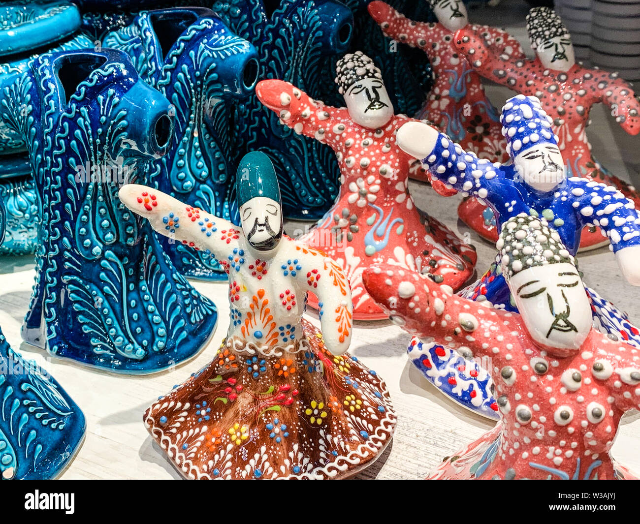 Porcelain figures of Turkish folk dancers, a traditional 'sufi whirling' dance with mediation. Nice gift in a shop as souvenir of Turkey Stock Photo