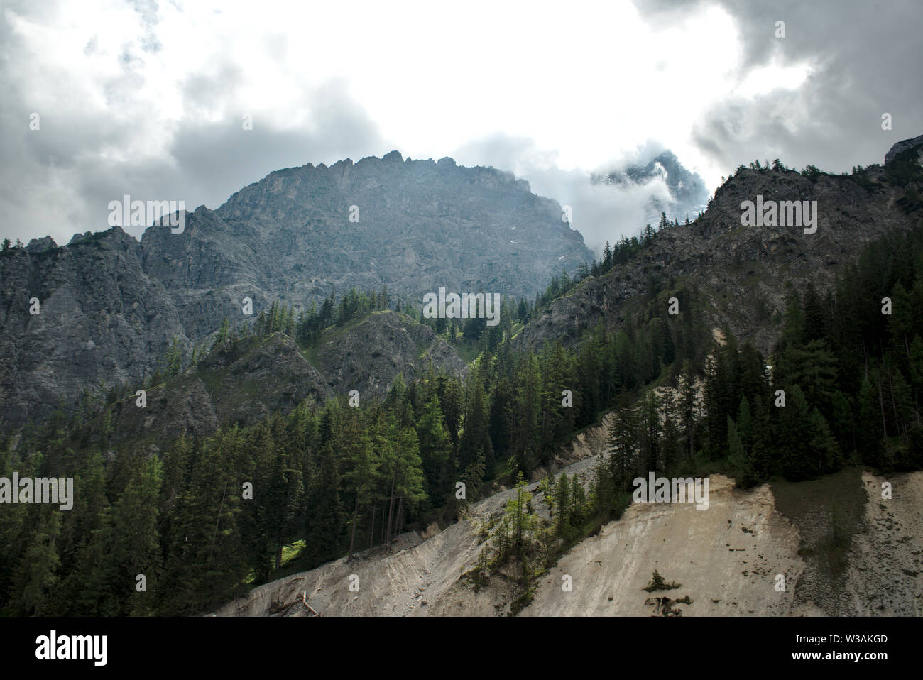 Hiking in the alps at summertime Stock Photo