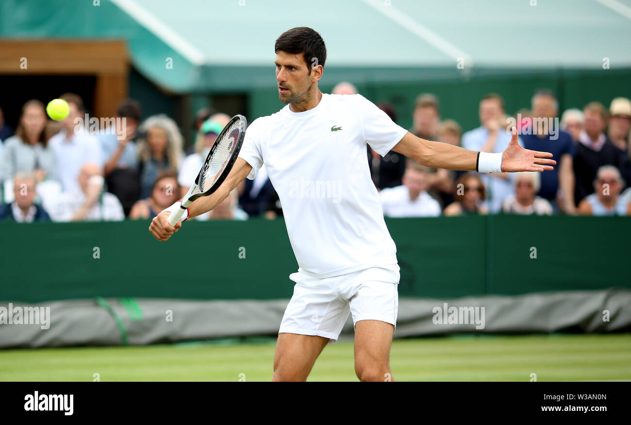 Novak Djokovic during a practice session ahead of the men's singles final on day thirteen of the Wimbledon Championships at the All England Lawn Tennis and Croquet Club, Wimbledon. Stock Photo