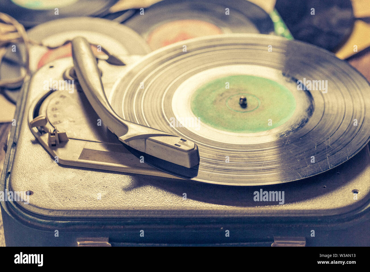 Vintage record player and old scratched vinyl records Stock Photo Alamy