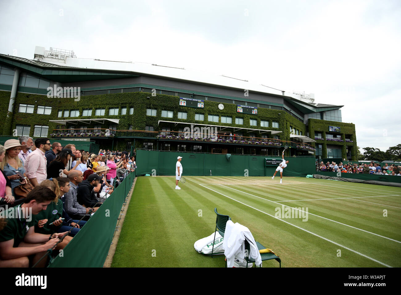 Novak Djokovic during a practice session ahead of the men's singles final on day thirteen of the Wimbledon Championships at the All England Lawn Tennis and Croquet Club, Wimbledon. Stock Photo