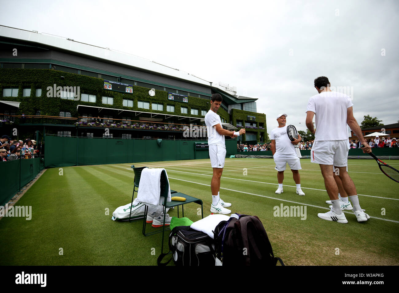 Novak Djokovic during a practice session ahead of the men's singles final on day thirteen of the Wimbledon Championships at the All England Lawn Tennis and Croquet Club, Wimbledon. Stock Photo