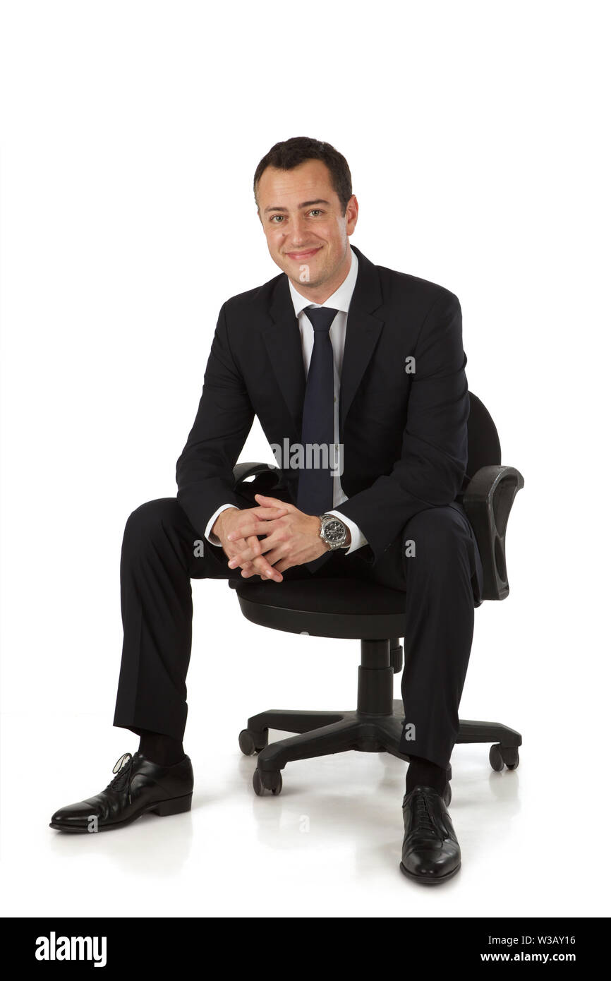 Businessman Sitting In An Office Chair Stock Photo Alamy businessman-sitting-in-an-office-chair-stock-photo-alamy