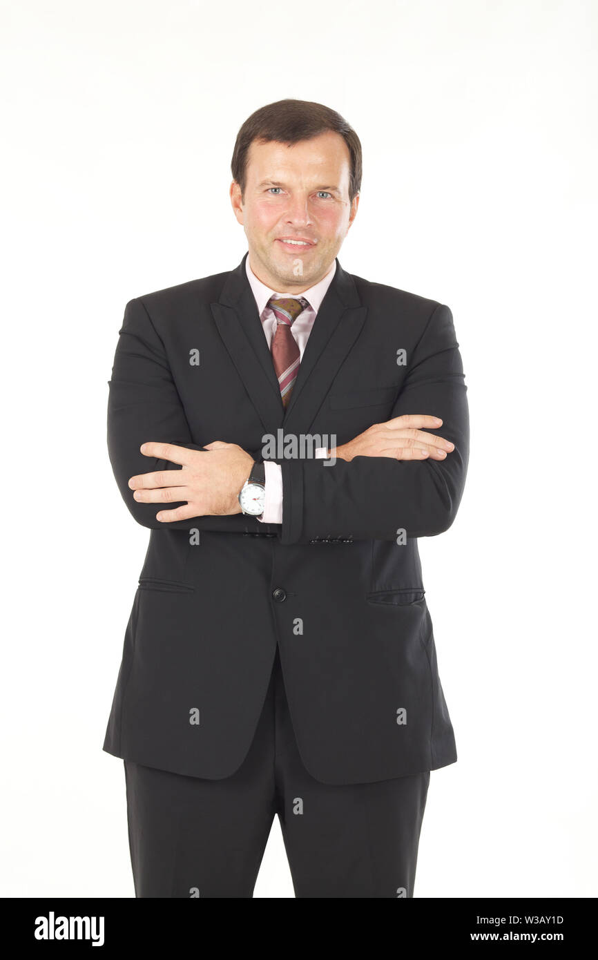 Portrait of a businessman standing with his arms crossed Stock Photo ...