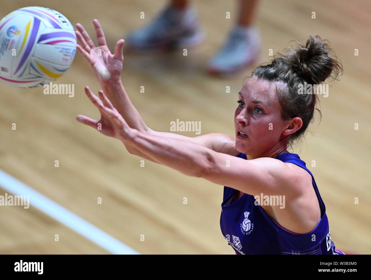 Liverpool, UK. 14 July 2019. Lynsey Gallagher (Scotland) during the Preliminary game between Uganda and Scotland at the Netball World Cup. M and S arena, Liverpool. Merseyside. UK. Credit Garry Bowdenh/SIP photo agency/Alamy live news. Stock Photo
