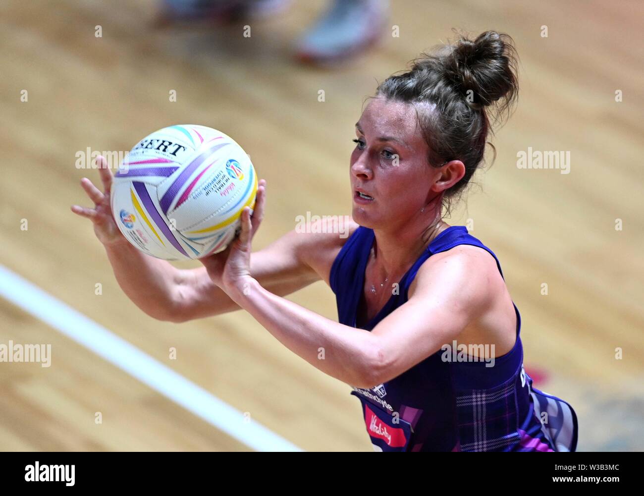 Liverpool, UK. 14 July 2019. Lynsey Gallagher (Scotland) during the Preliminary game between Uganda and Scotland at the Netball World Cup. M and S arena, Liverpool. Merseyside. UK. Credit Garry Bowdenh/SIP photo agency/Alamy live news. Stock Photo