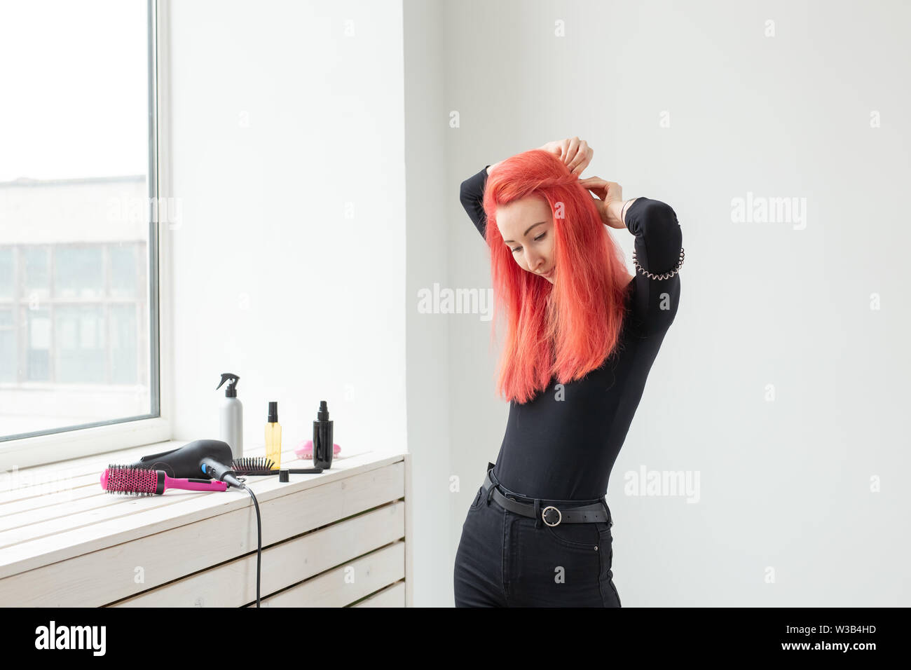 Beautiful Red Haired Girl With Long Hair She Is Weaves A Braid