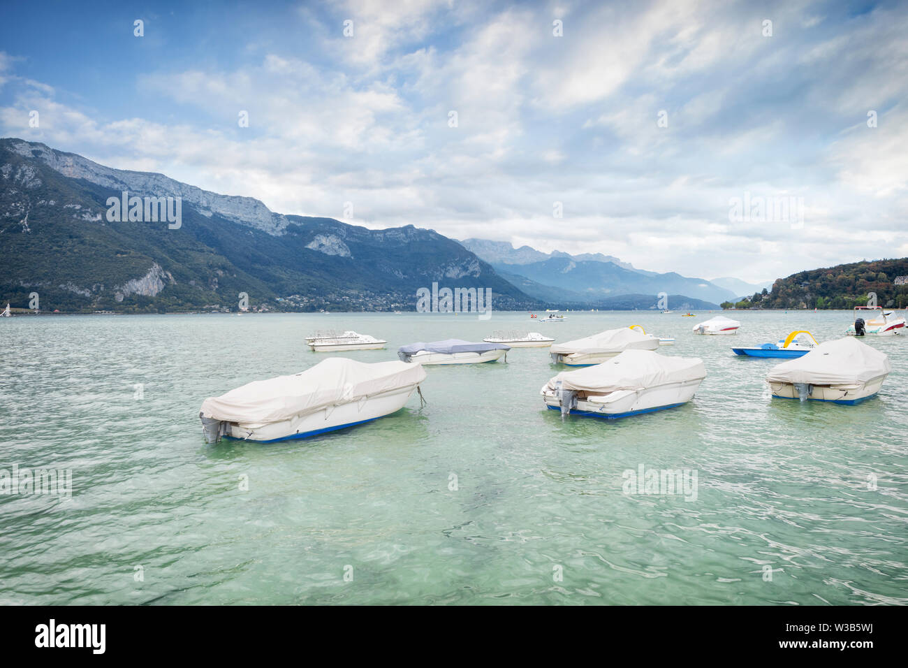 Lake of Annecy. Moody landscape with boats Stock Photo