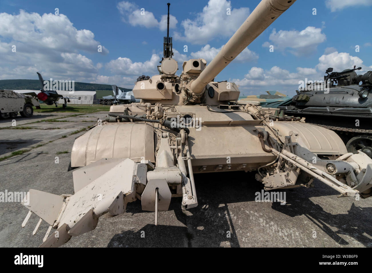 BUDAPEST/HUNGARY - 05.18, 2019: Russian T-72 main battle  tank of a sapper battalion with obstacle demolition tools on display at a defense show. Stock Photo