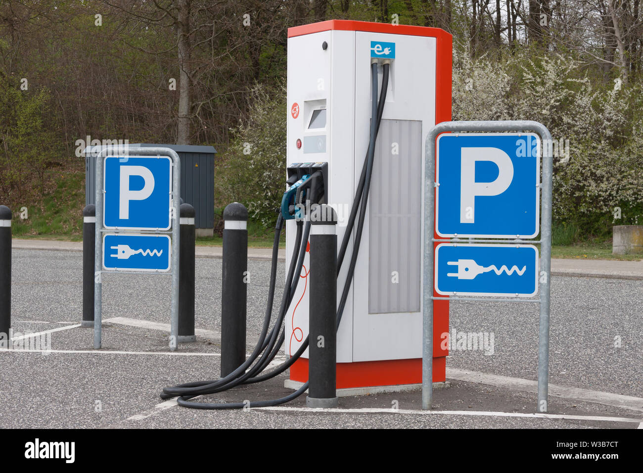 Small electric car charging station in Denmark Stock Photo Alamy
