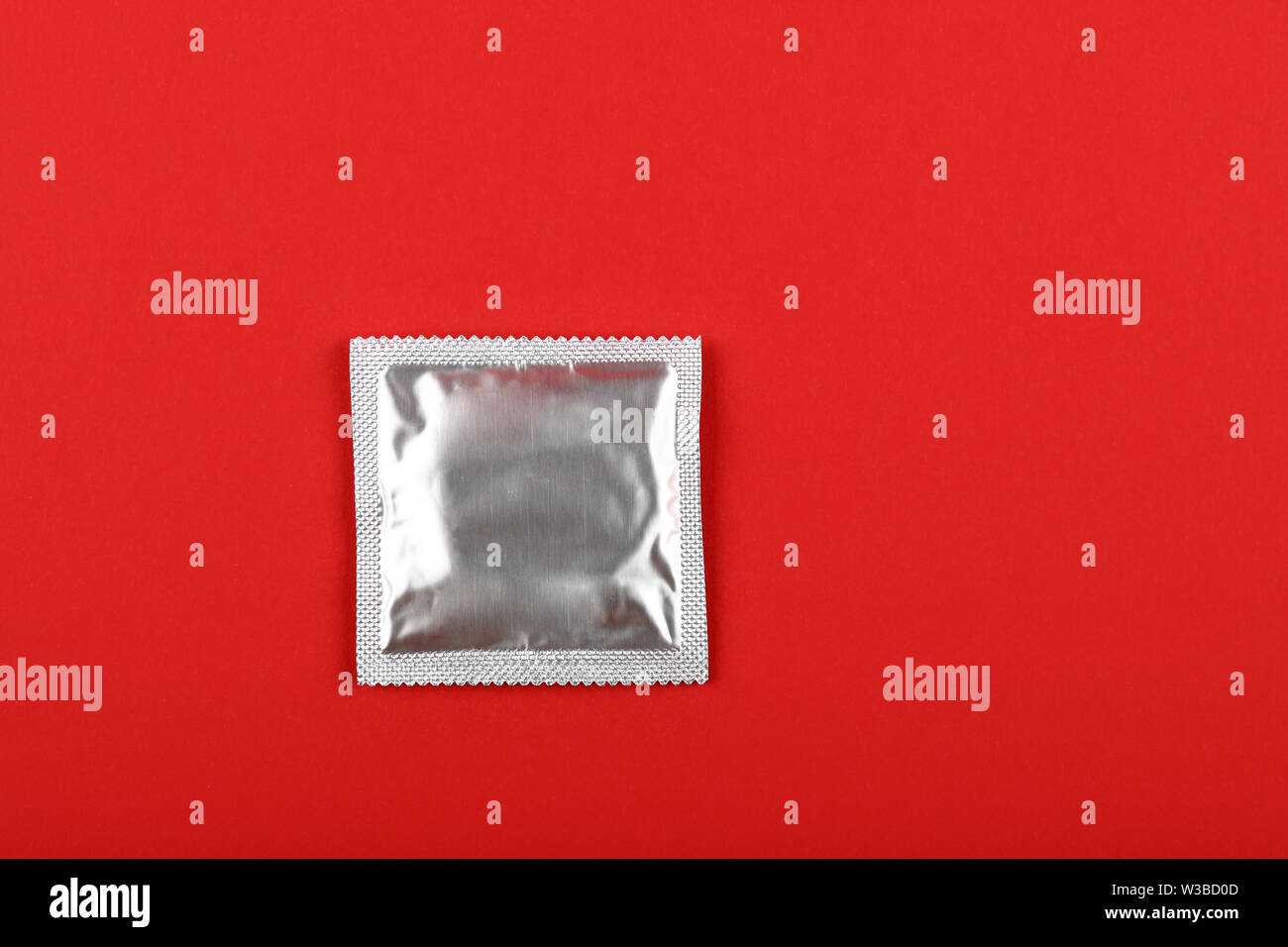 Close Up One Condom Silver Wrap Pack Over Vivid Red Background With Copy Space Elevated High Angle View Directly Above Stock Photo Alamy Close Up One Condom Silver Wrap Pack Over Vivid Red Background With Copy Space Elevated High Angle View Directly Above Stock Photo Alamy