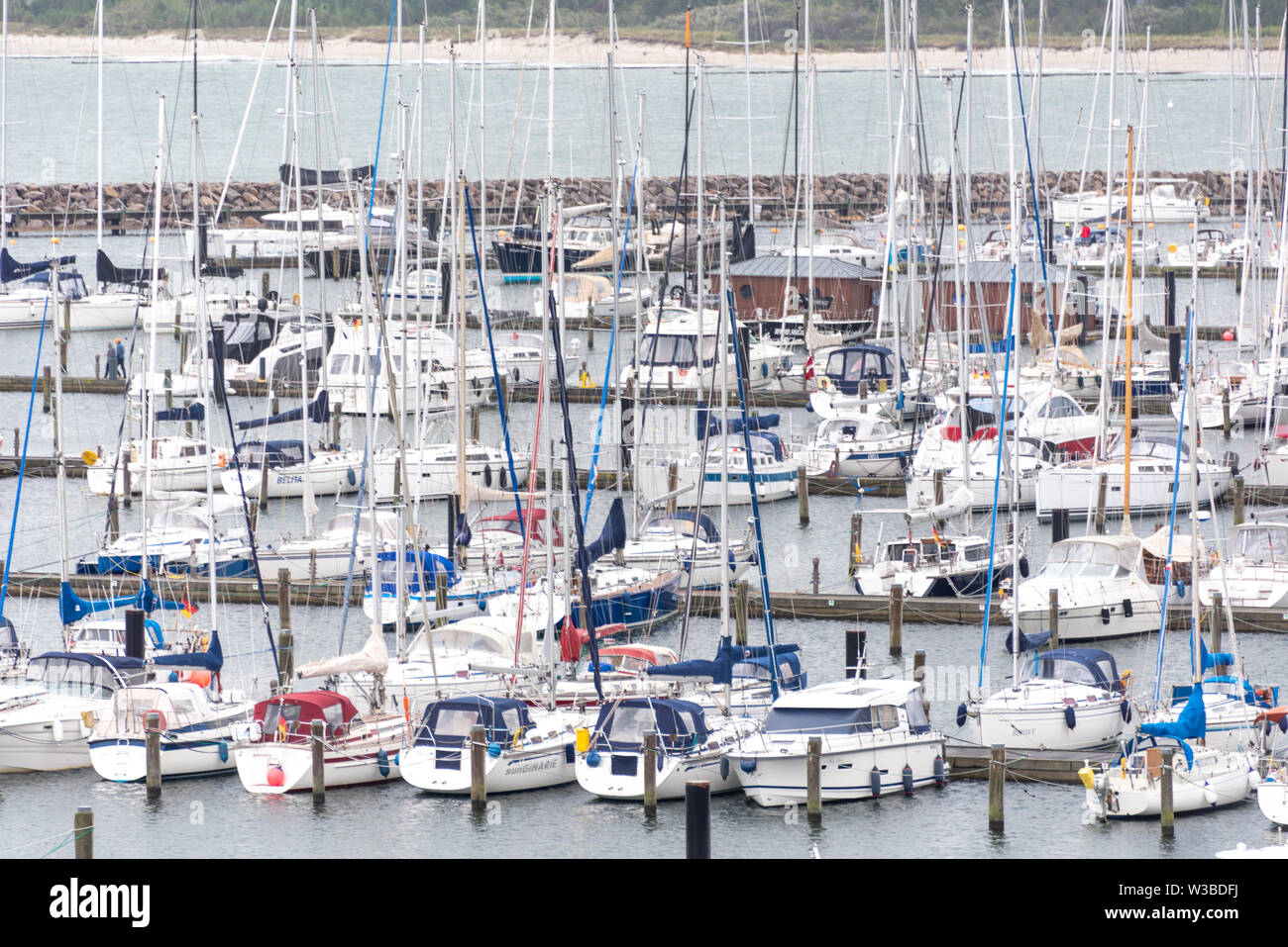 Rostock, Germany - July 7, 2019: View of yachts and sailing ships in the port of Rostock, Germany. Stock Photo