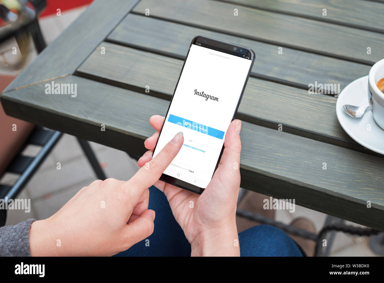 SARAJEVO, BOSNIA AND HERZEGOVINA - JULY 14, 2019:  Woman holding a smart phone with Instagram app. The concept of using the Instagram application by i Stock Photo