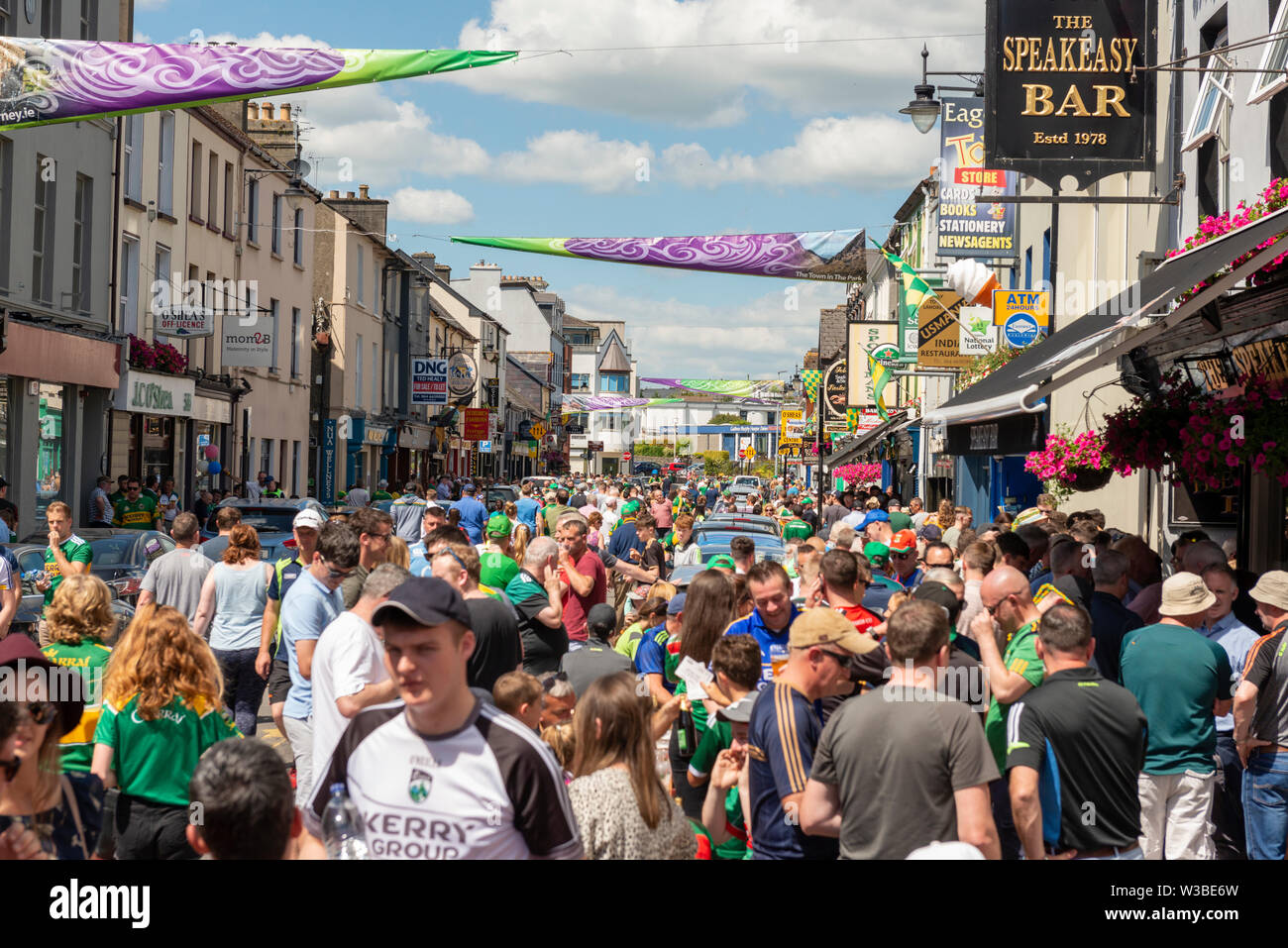 Match day Ireland Gaelic football fans supporters on High Street in Killarney before the Mayo and Kerry game in July 2019. Matchday in Killarney, County Kerry, Ireland Stock Photo