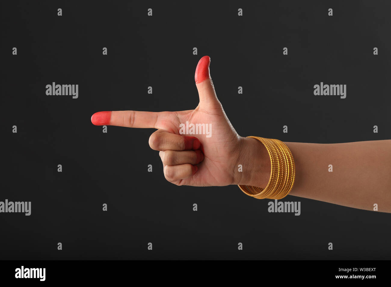 Indian woman performing Chandrakala hasta of Bharatanatyam dance Stock Photo