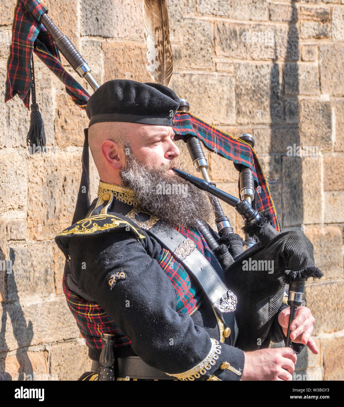 Blowing bagpipes hires stock photography and images Alamy