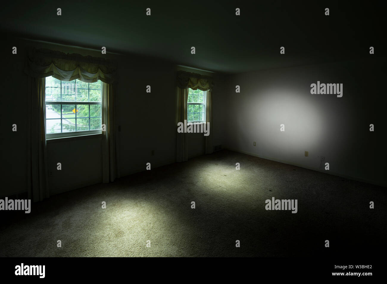 Mysterious Empty Room With Glowing Light Stock Photo