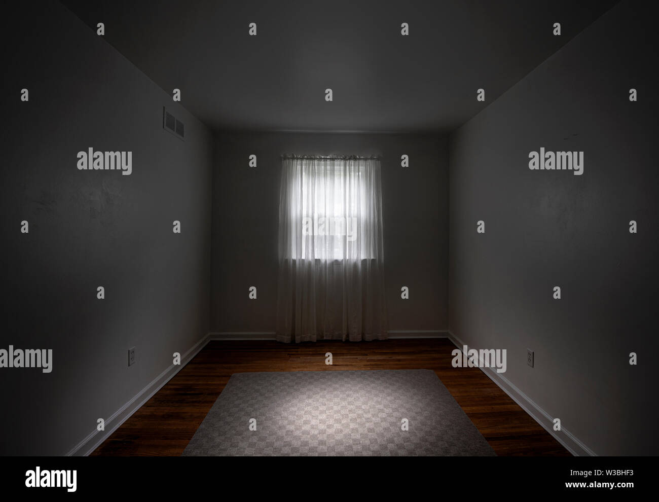 Mysterious Empty Room With Glowing Light Stock Photo