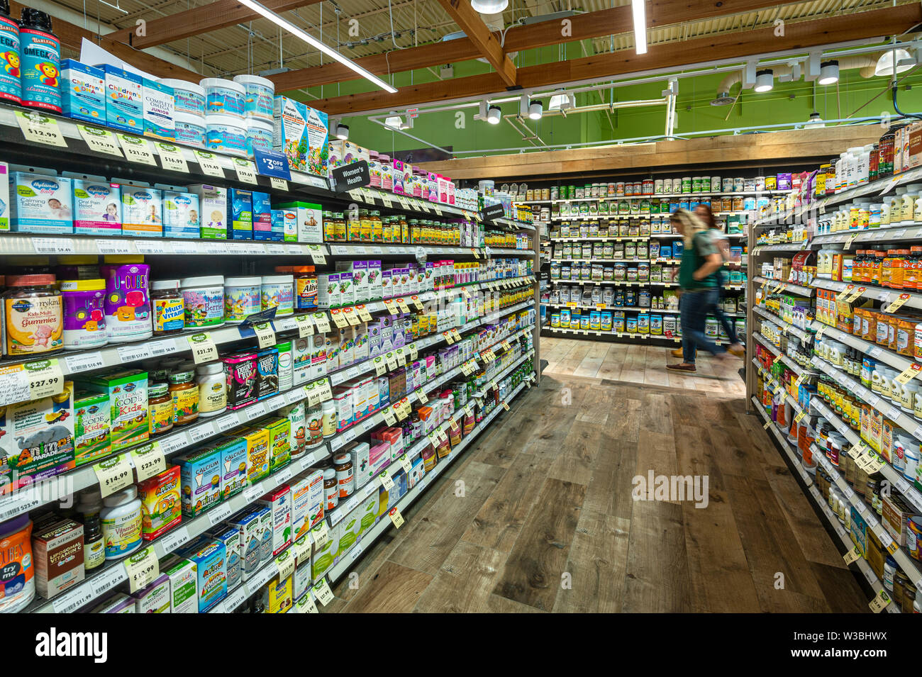 Vitamin & Nutritional Supplements Aisle In Grocery Store, USA Stock Photo