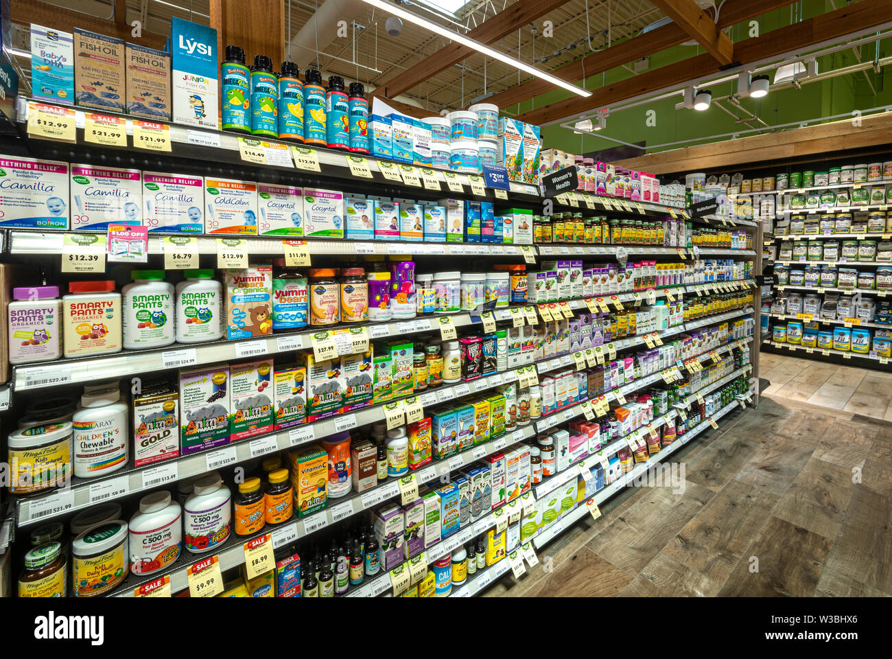 Vitamin & Nutritional Supplements Aisle In Grocery Store, USA Stock Photo