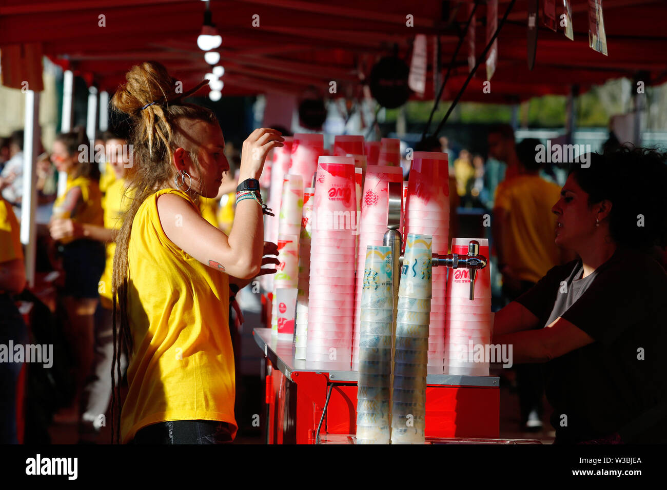 Calvia, Mallorca / Spain - May 10, 2019: Waiters work in the bar serving drinks during the Mallorca live festival in Magaluf, Calvia in the Spanish is Stock Photo