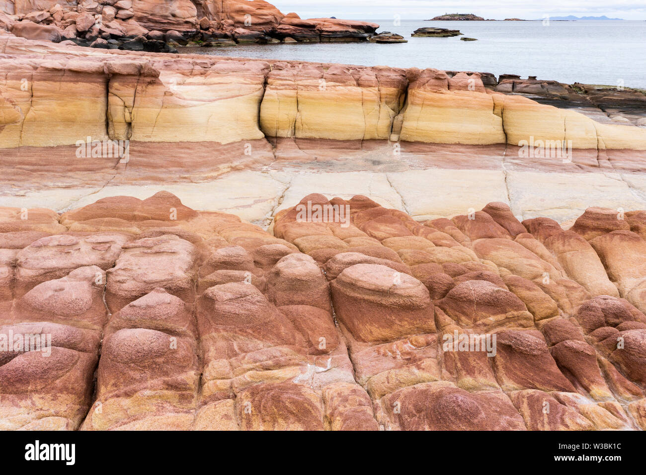 red rock formation on an empty beach in Baja California, Mexico Stock Photo